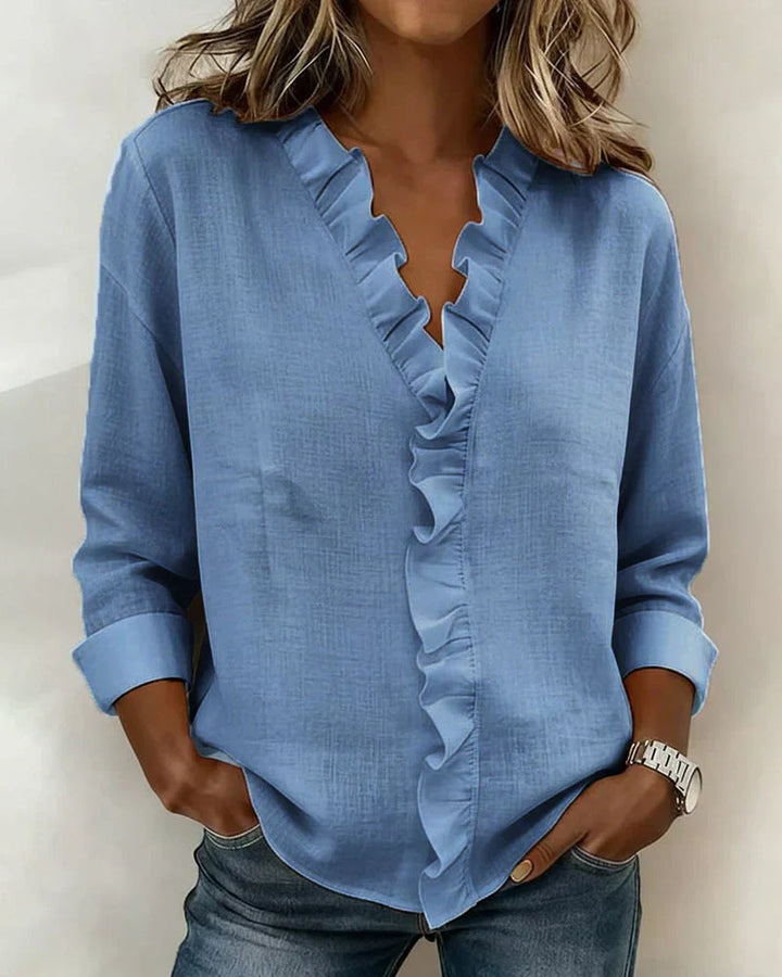 Anora |  Blusa con volantes y cuello en V